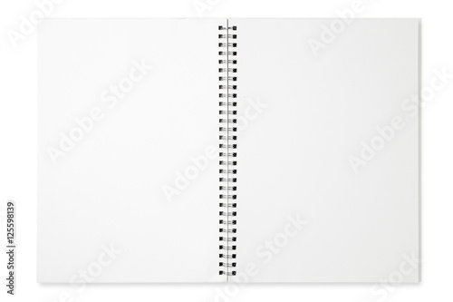 Blank spiral notebook isolated on white background photo