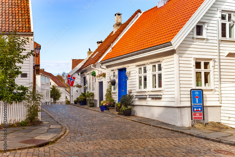Street with white houses in the old part of Stavanger, Norway.