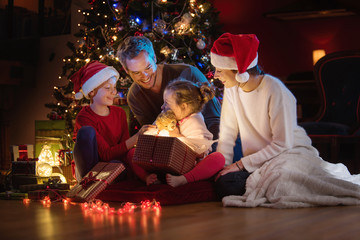 At christmas a lovely family find a digital tablet in their gift
