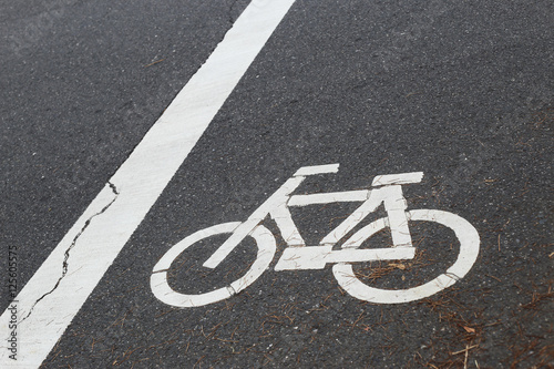 The sign of a bicycle on street.