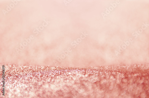 Rose gold glitter, Defocused abstract holidays lights on background. new year and christmas background.