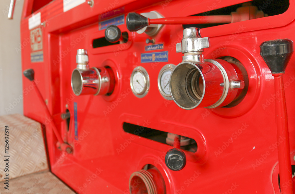 Firefighting equipment on red fire truck. Firefighting equipment on red fire truck.