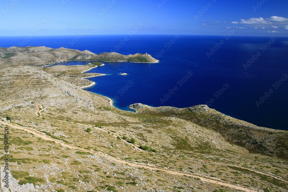 Seascape and coast of island Lastovo with lighthouse Struga on Adriatic sea, Croatia