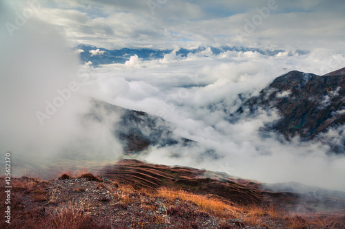 Misty autumn morning in Caucasus mountains.