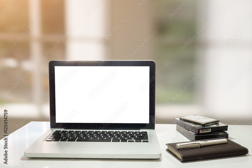 Place of work with notebook or laptop and mouse on wood desk aga Place of work with notebook or laptop and mouse on wood desk aga