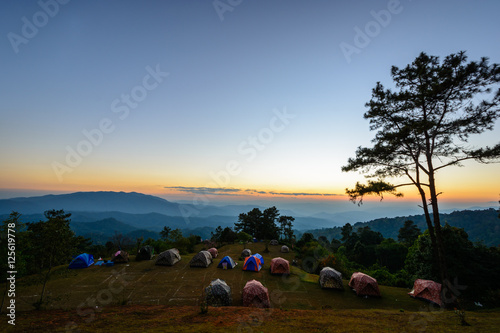 Huay Nam Dang national park view point at sunset with camping tents, Chiang mai, Thailand photo