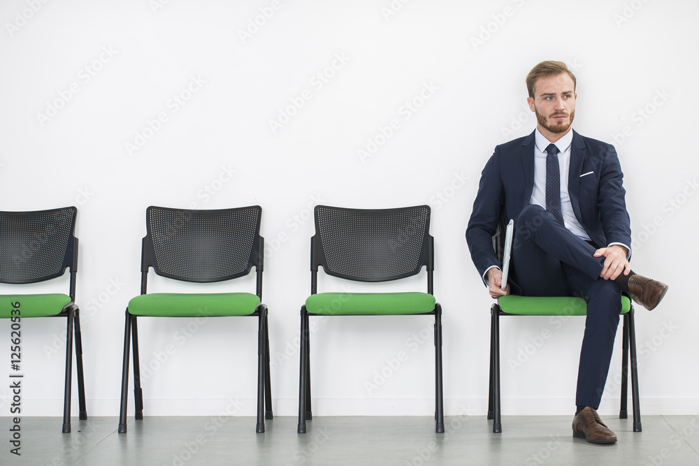 Stressed business people waiting for job interview Stressed business people waiting for job interview