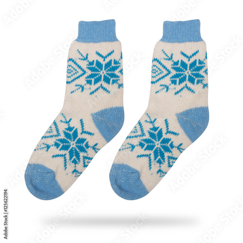 pair of woolen socks with a pattern isolated on white