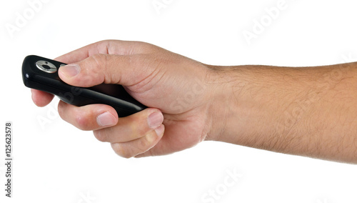 hand with remote control on white