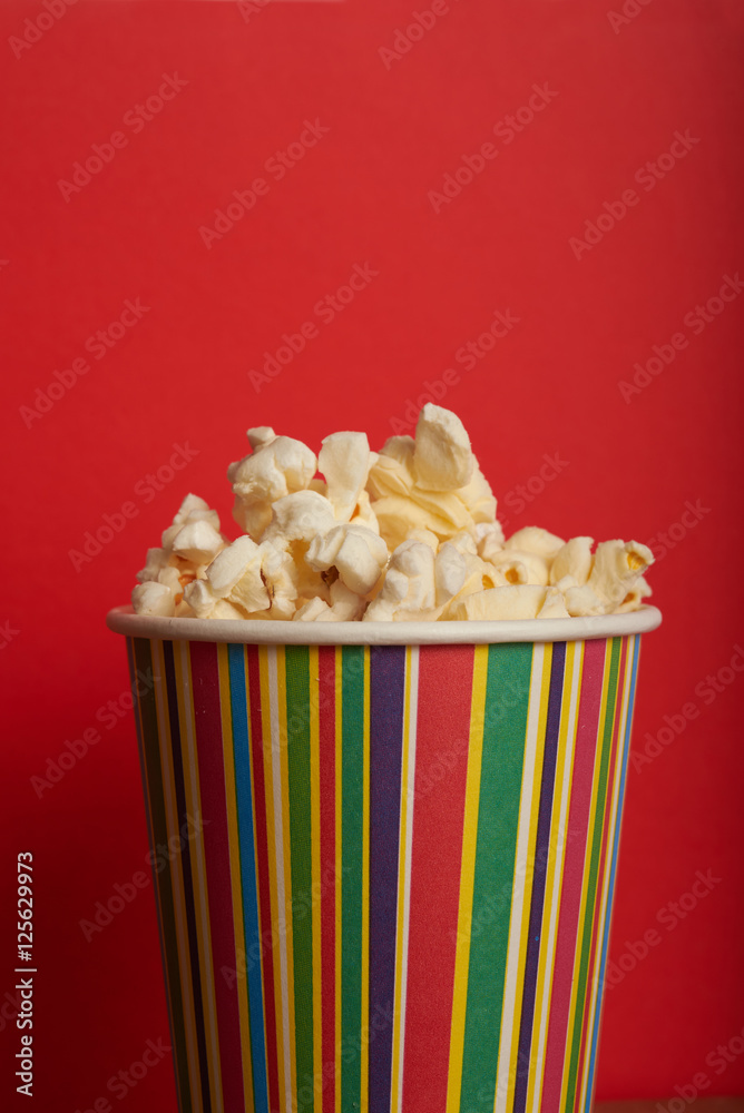 popcorn in paper cup popcorn in paper cup