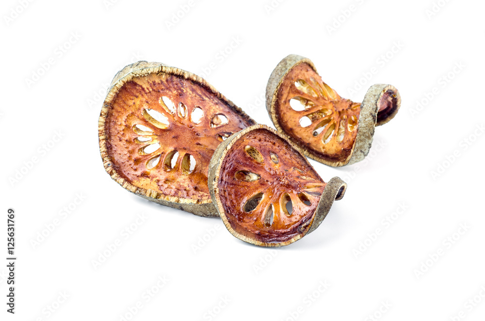 Dried Bael Fruit tea (Aegle marmelos) isolated on white backgrou