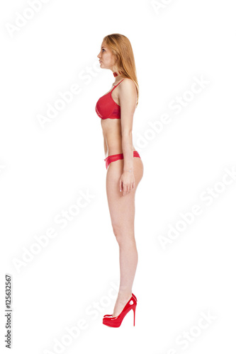 Young beautiful blonde woman in red bikini