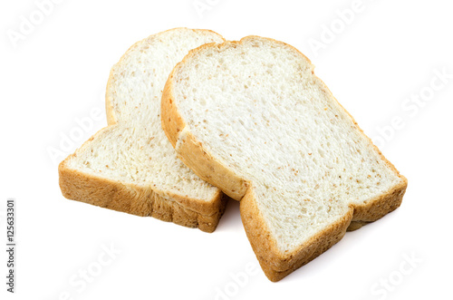 sliced whole wheat bread on white background.