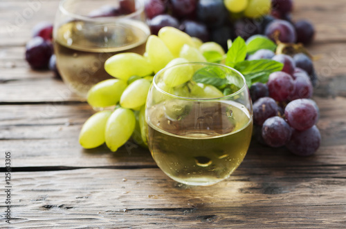 White grapes juice on the wooden table © nolonely