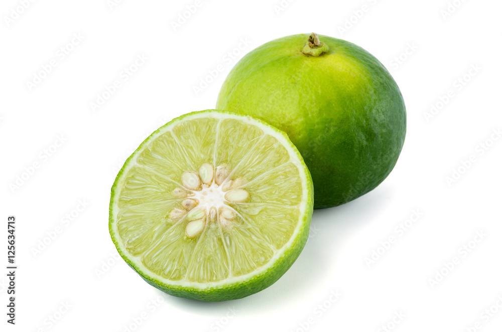 Fresh lime fruit and half of lime on white background Fresh lime fruit and half of lime on white background