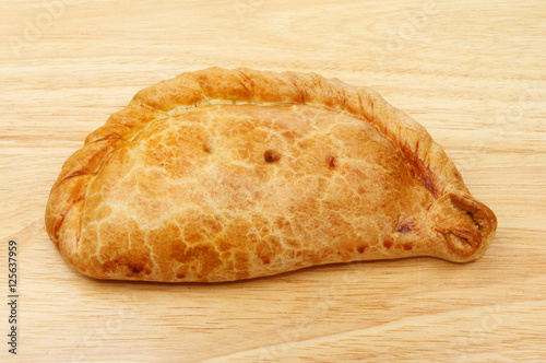 Photography Cornish pasty on wood