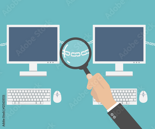 hand with magnifier analyzing chain