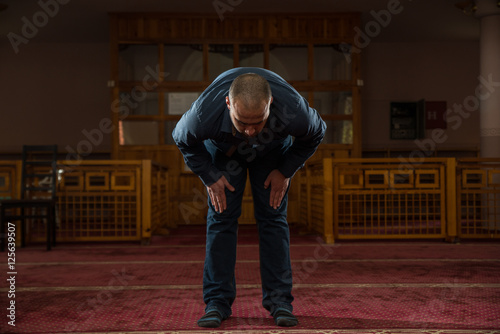 Religious man in mosque © ildintorlak