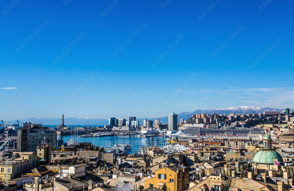 GENOA, ITALY,  February 1  2015: Panoramic view of old city and port of Genoa in a winter day under a beautiful blue sky / landscape/city/ view/ port/ city/ blue/ sky