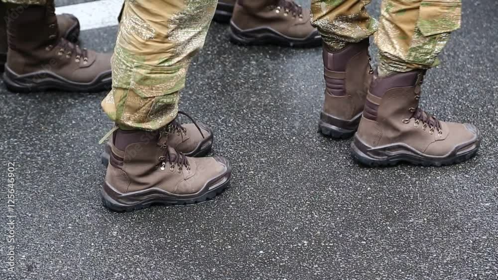 Feet of soldiers. Servicemen at the military parade. Soldiers in military uniform
Feet of soldiers. Servicemen at the military parade. Soldiers in military uniform