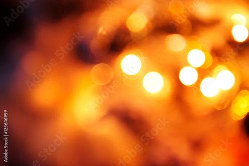 Celebratory background. / Beautiful Rasfokus lights of Christmas garlands. photo