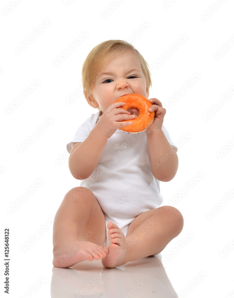 Infant child baby boy toddler eat sweet donut candy fast food Infant child baby boy toddler eat sweet donut candy fast food