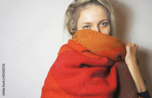 Принти на полотні Young beautiful woman wrapped in plaid