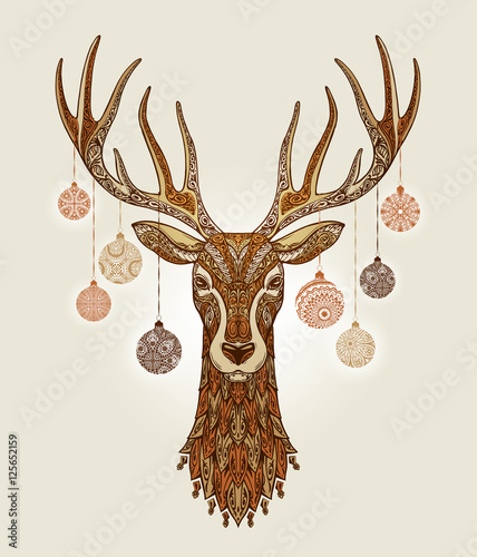 Decorative christmas deer with ornament and decoration balls on antlers
