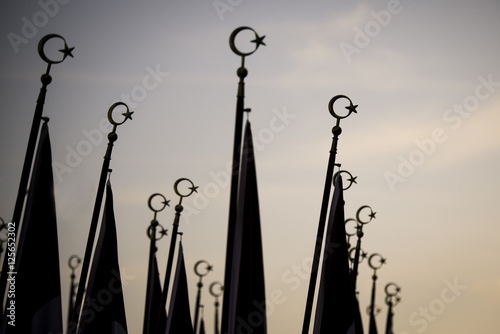 Flags silhouettes and crescent and star. photo