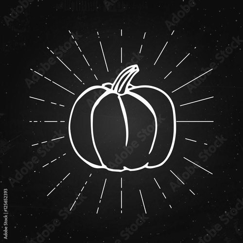 Vector illustration of pumpkin on the chalkboard. Happy Halloween concept. Vintage rays.