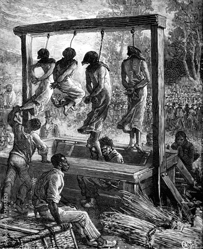 Valokuva A quadruple execution in Mauritius. The executioner hung legs of