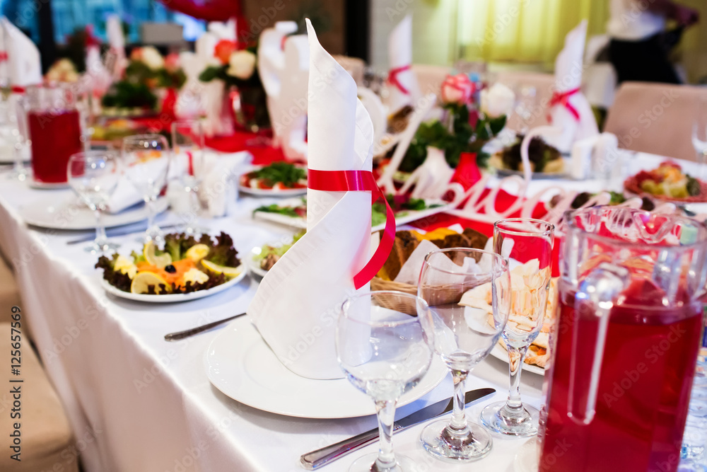 Served banquet table in restaurant Served banquet table in restaurant