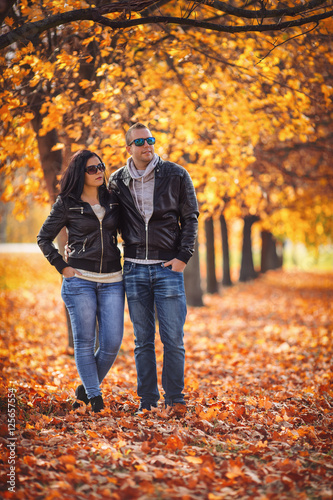 Young couple hiking in the park at autumn © steevy84