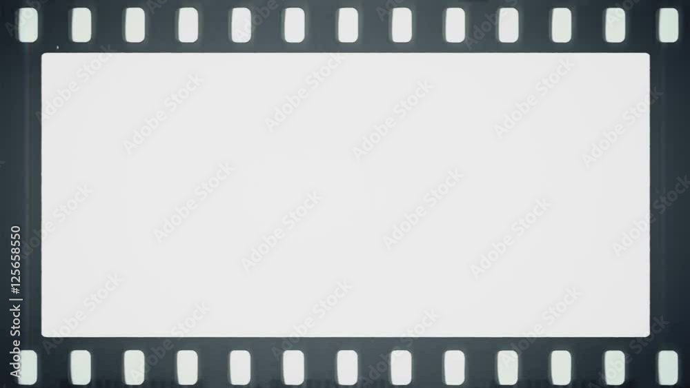Film reel moves horizontally with empty frame in the middle. Film reel moves horizontally with empty frame in the middle.