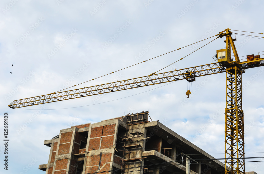 Crane and building construction site Crane and building construction site