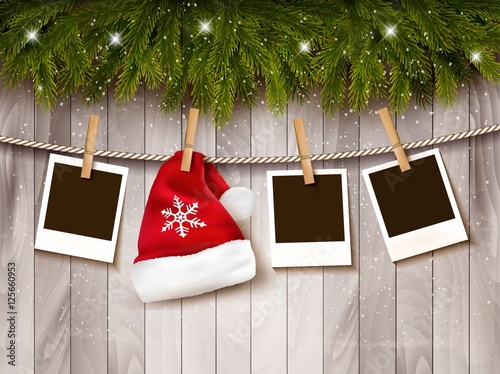 Christmas background with photos and a santa hat. Vector.