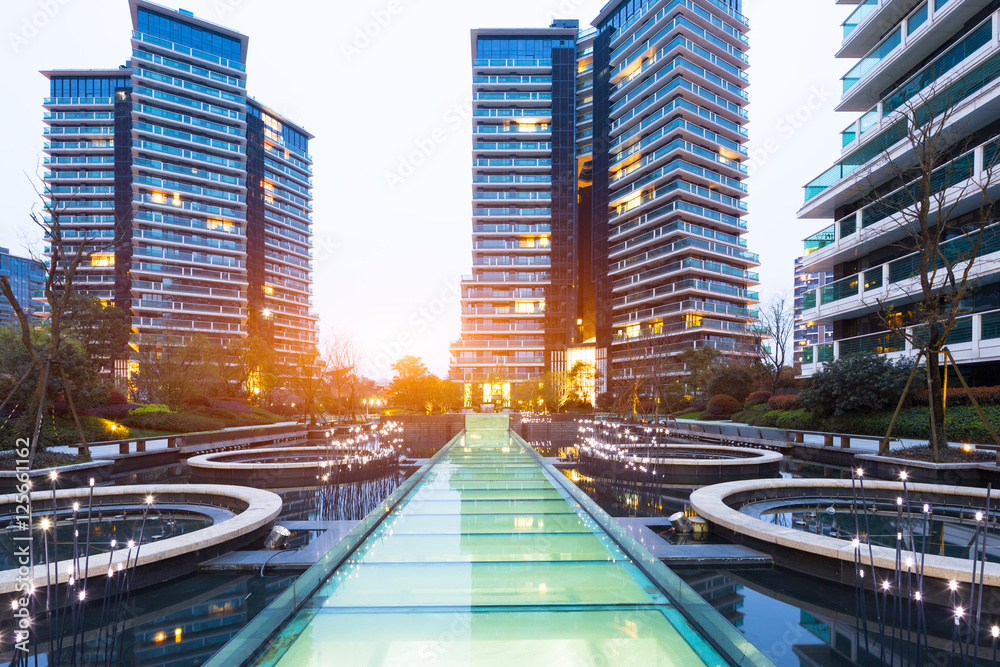 Obraz premium modern office buildings with sunbeam in hangzhou