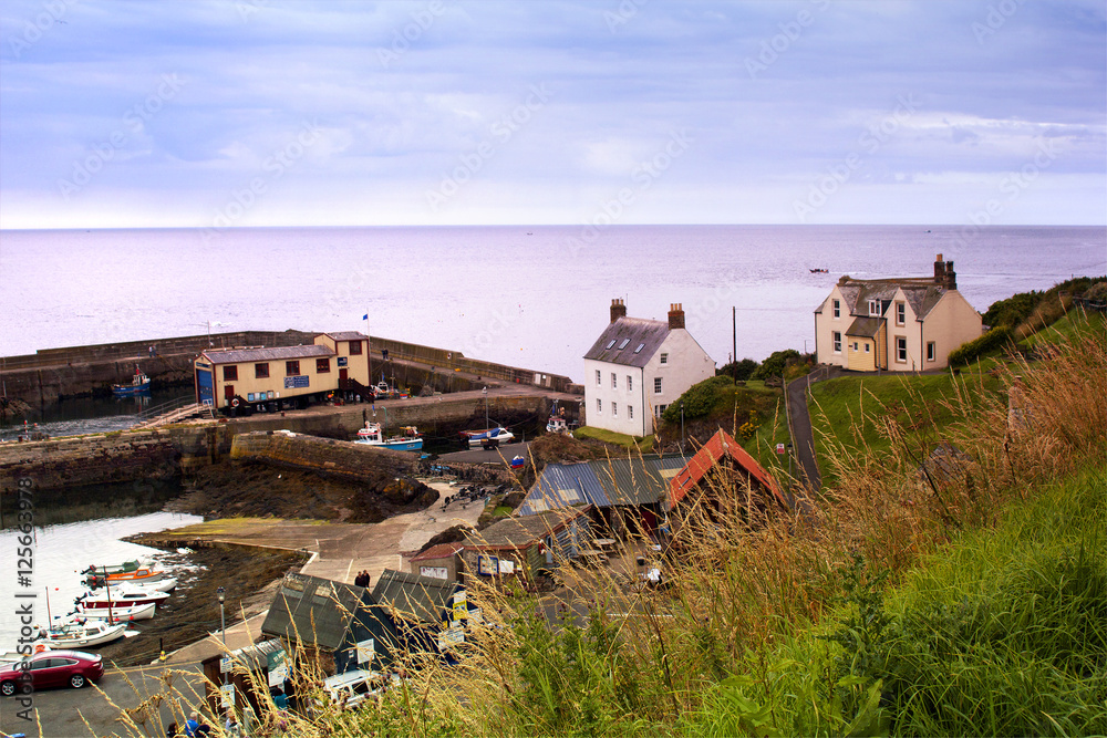 the harbour and village at St. Abbs in Berwickshire, Scotland. 0