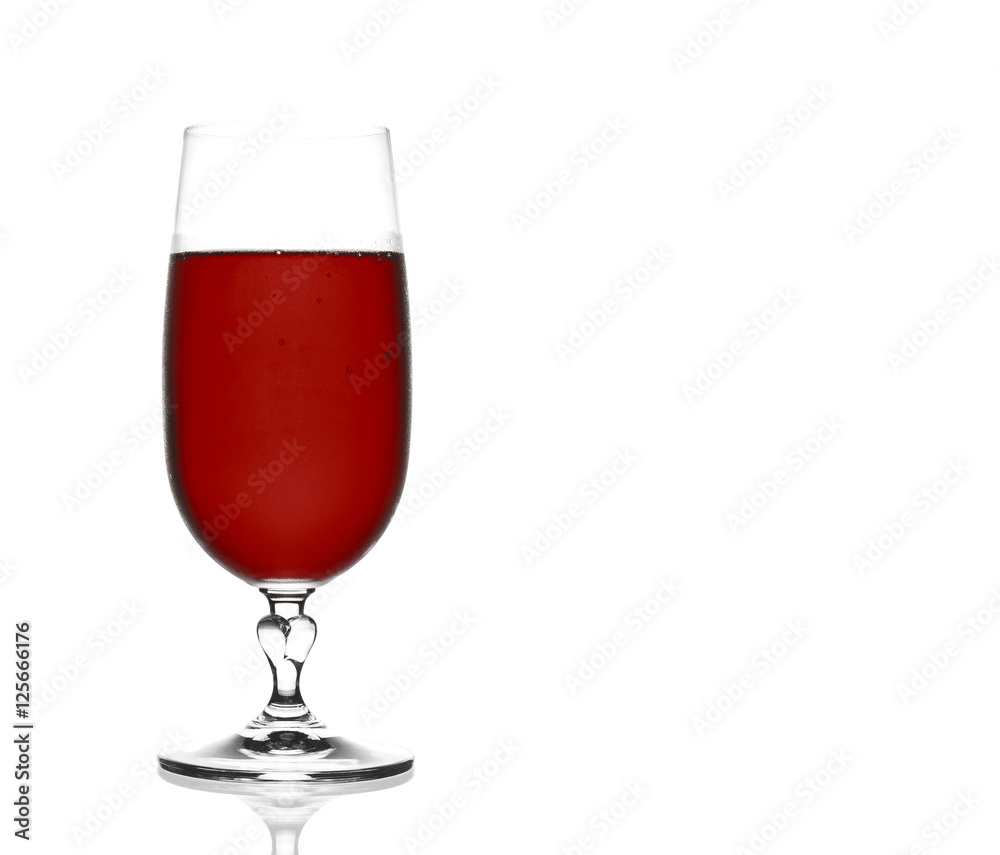 front view dark red wine chilled in clear glass with steam on wh front view dark red wine chilled in clear glass with steam on wh