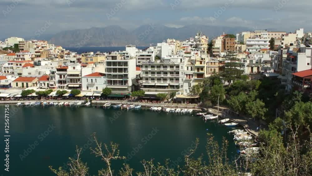 Aerial view. Seaport. White houses in Greek style. Aerial view. Seaport. White houses in Greek style.