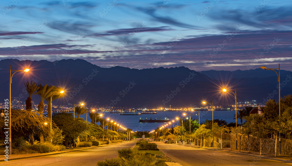 Scenic view on the Red Sea and Jordanian mountains from a local street in Eilat, Israel 