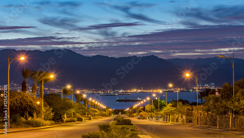 Scenic view on the Red Sea and Jordanian mountains from a local street in Eilat, Israel  © sergei_fish13