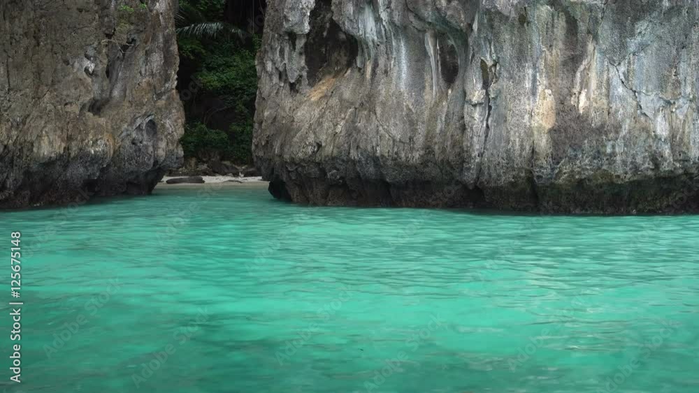 Boat trip to tropical islands. View on beautiful turquoise sea and rocks Boat trip to tropical islands. View on beautiful turquoise sea and rocks