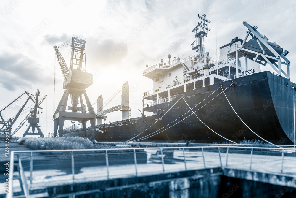 Cargo container ship at harbor. Cargo container ship at harbor.