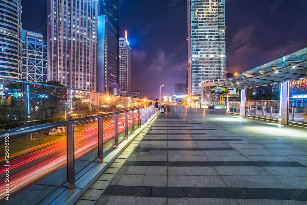 footbridge with cityscape at night in Shanghai,China.