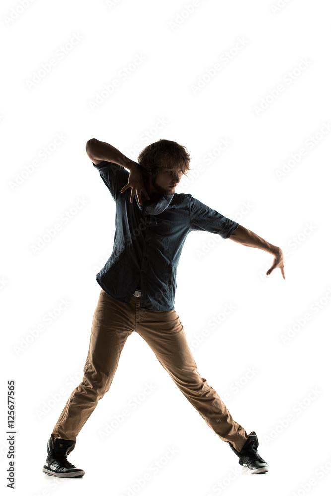 Obraz premium Modern style dancer posing on studio background