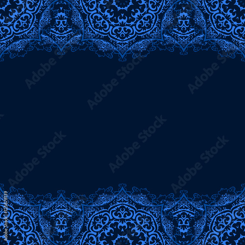 Vector decorative border with blue lace from snowflakes on dark