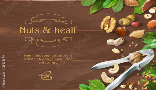 Mix of natural raw nuts on wooden background