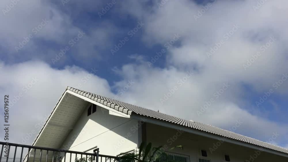 Time lapse moving cloud over the roof Time lapse moving cloud over the roof