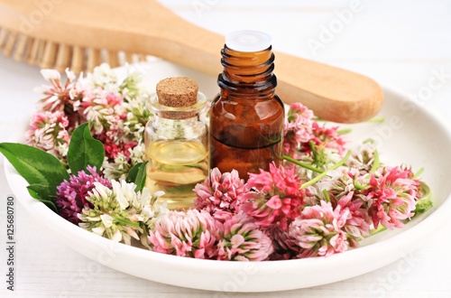 Red clover extract and aroma essenial oil for natural cosmetic haircare treatment. 
